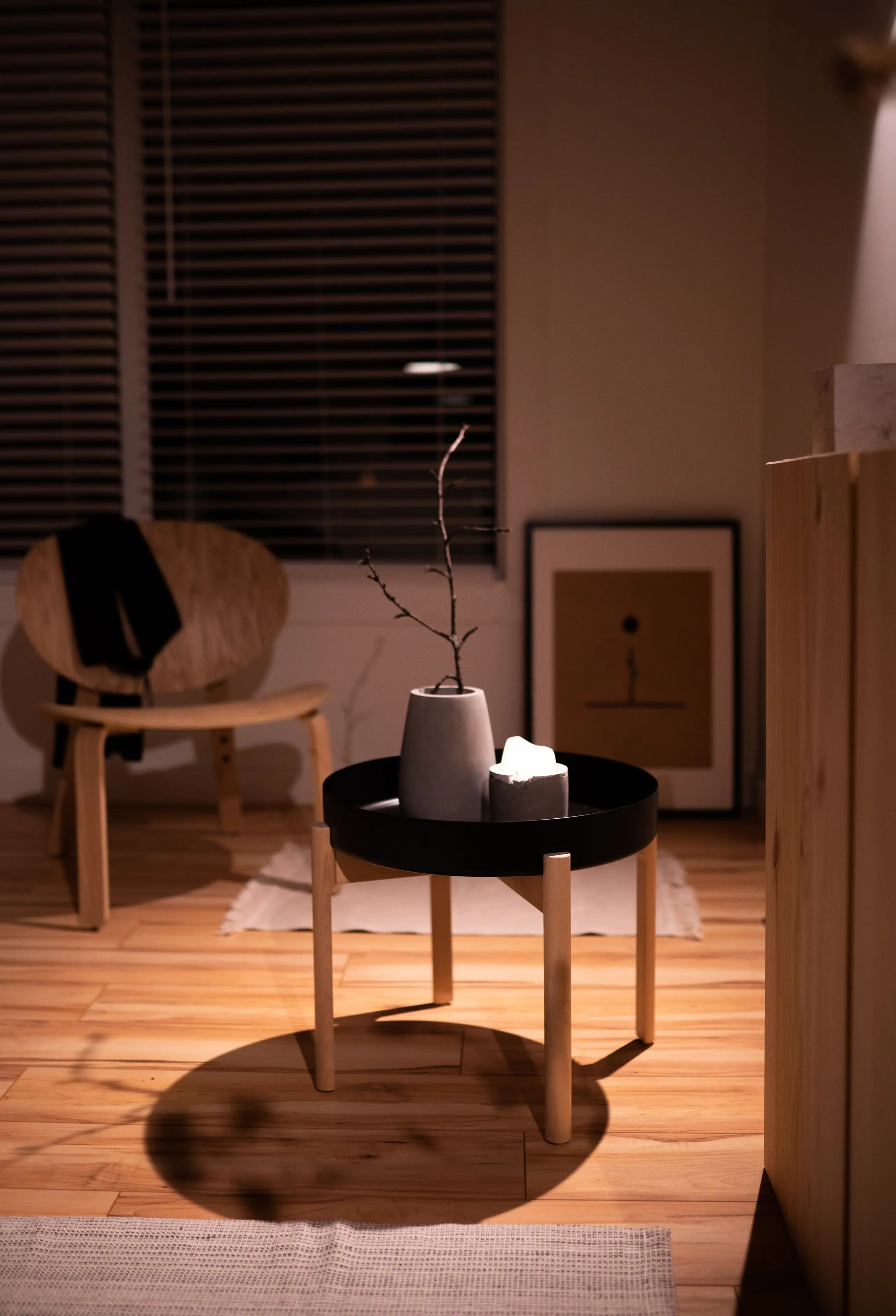 The reading corner in the evening, lit by a single lamp