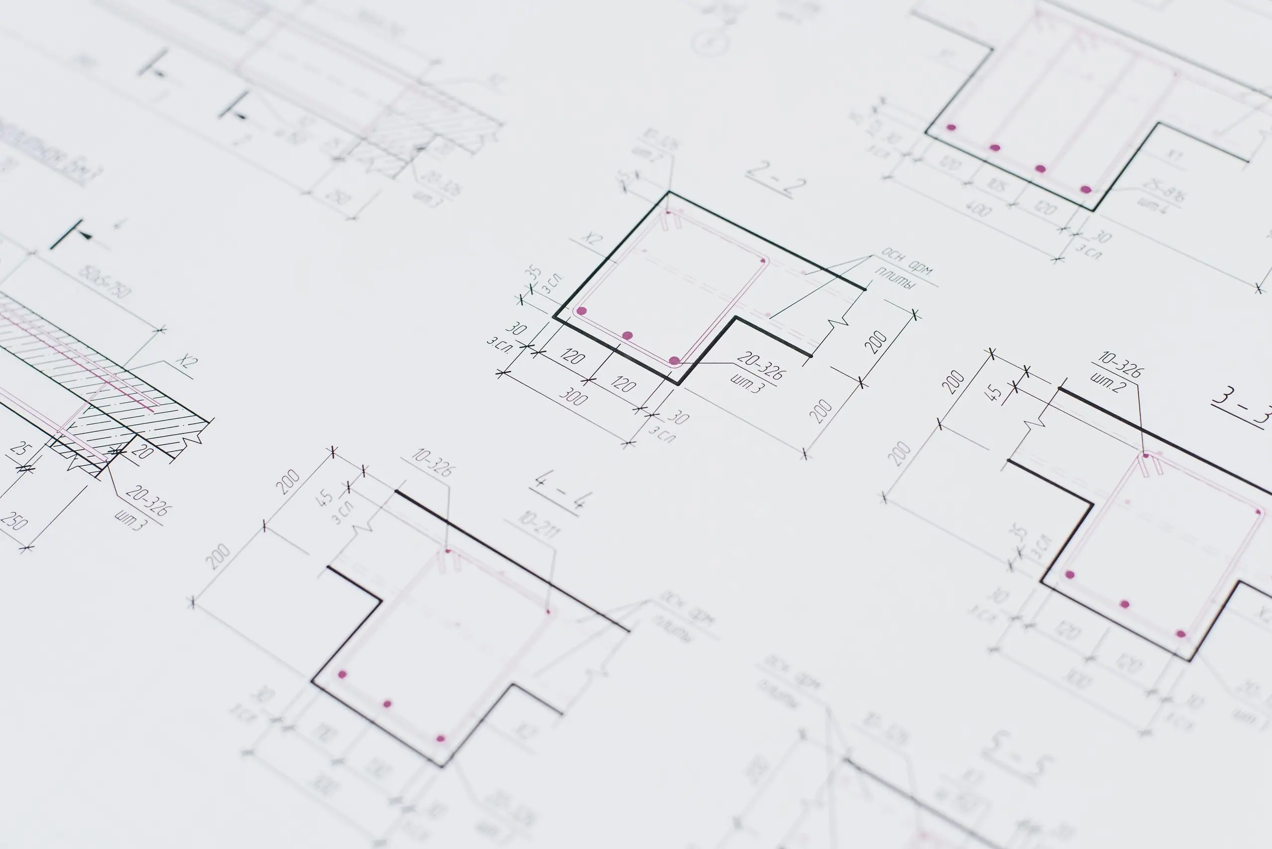 Detailed construction drawings showing wall junctions and dimensions